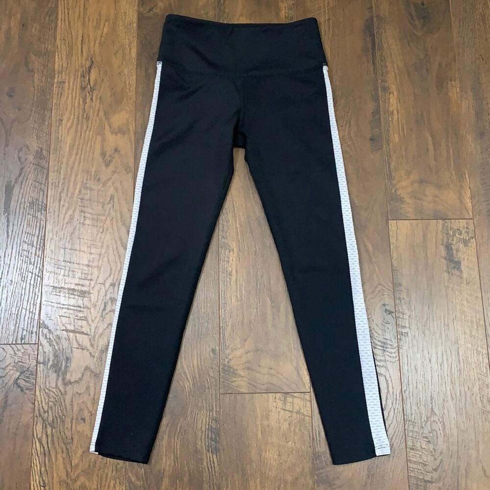 NOLI High-Waisted Capri Black/White Racing Stripe Mesh Leggings.